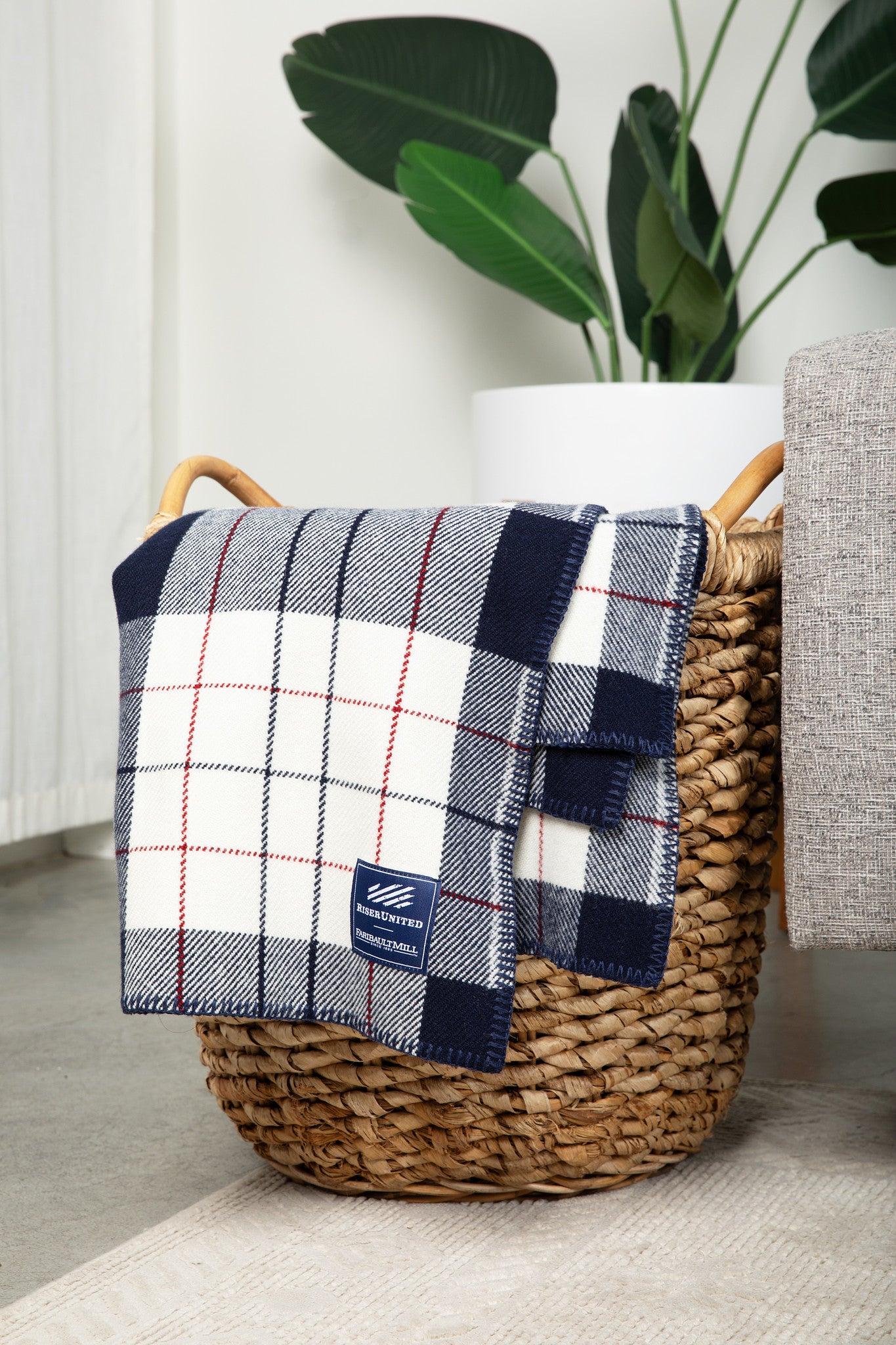 Vintage red, white, and blue plaid merino wool blanket