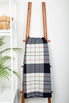 Vintage red, white, and blue plaid merino wool blanket